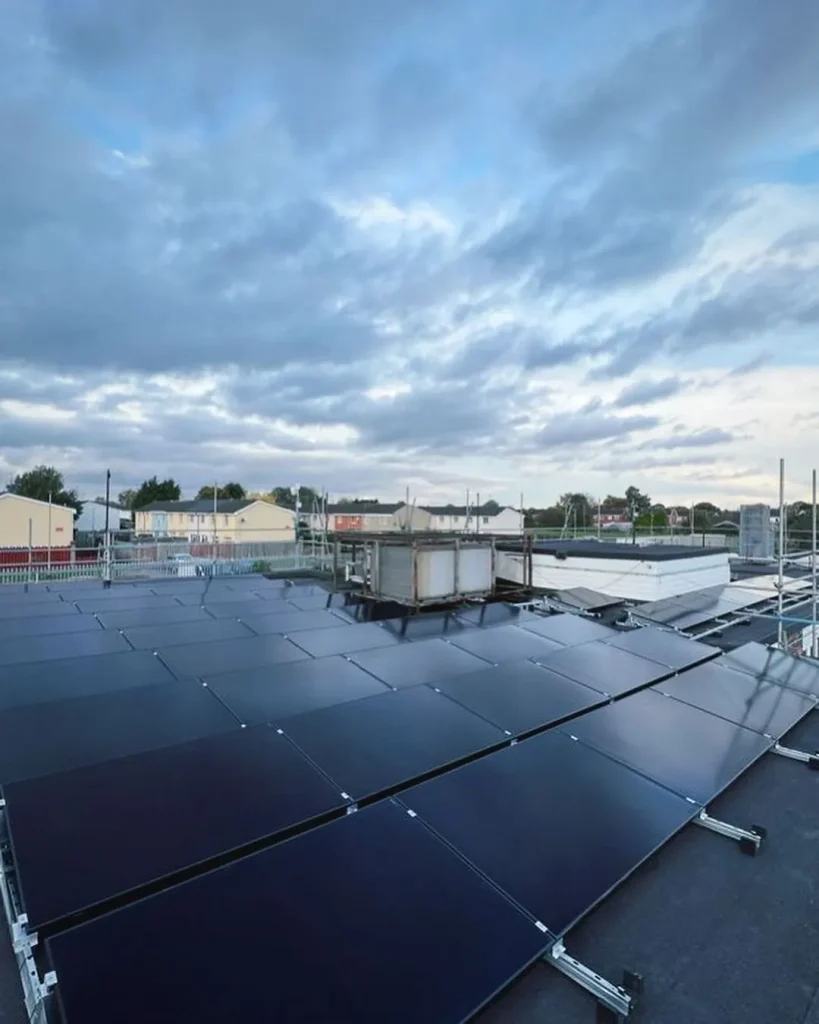 Flat rooftop solar panel installation with metal frames