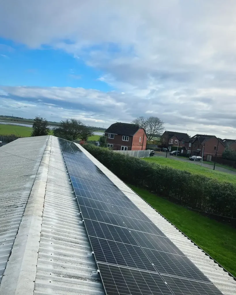 Rooftop solar panel installation on corrugated metal roof