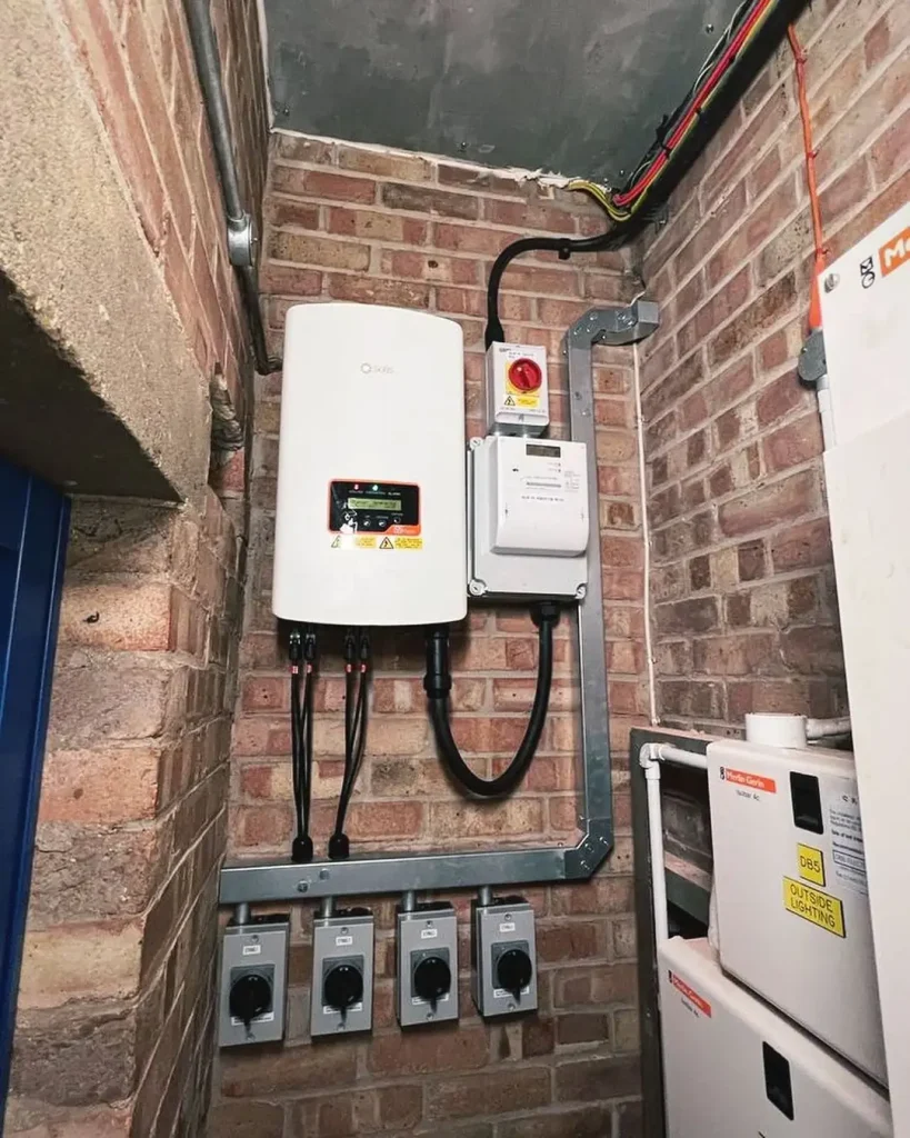 Solar inverter system mounted on brick wall